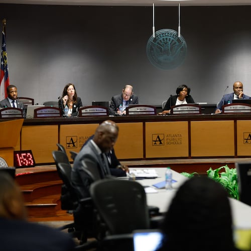 Atlanta Public Schools board members listen to public comment at a meeting in Atlanta on Aug. 10, 2026. (Arvin Temkar/AJC)