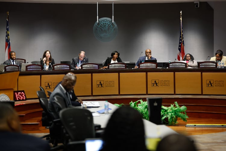 Atlanta Public Schools board members listen to public comment at a meeting in Atlanta on Aug. 10, 2026. (Arvin Temkar/AJC)