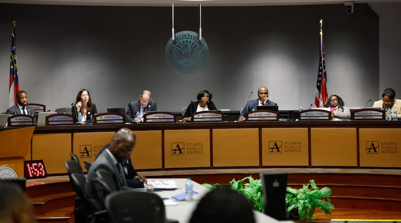 Atlanta Public Schools board members listen to public comment at a meeting in Atlanta on Aug. 10, 2026. (Arvin Temkar/AJC)