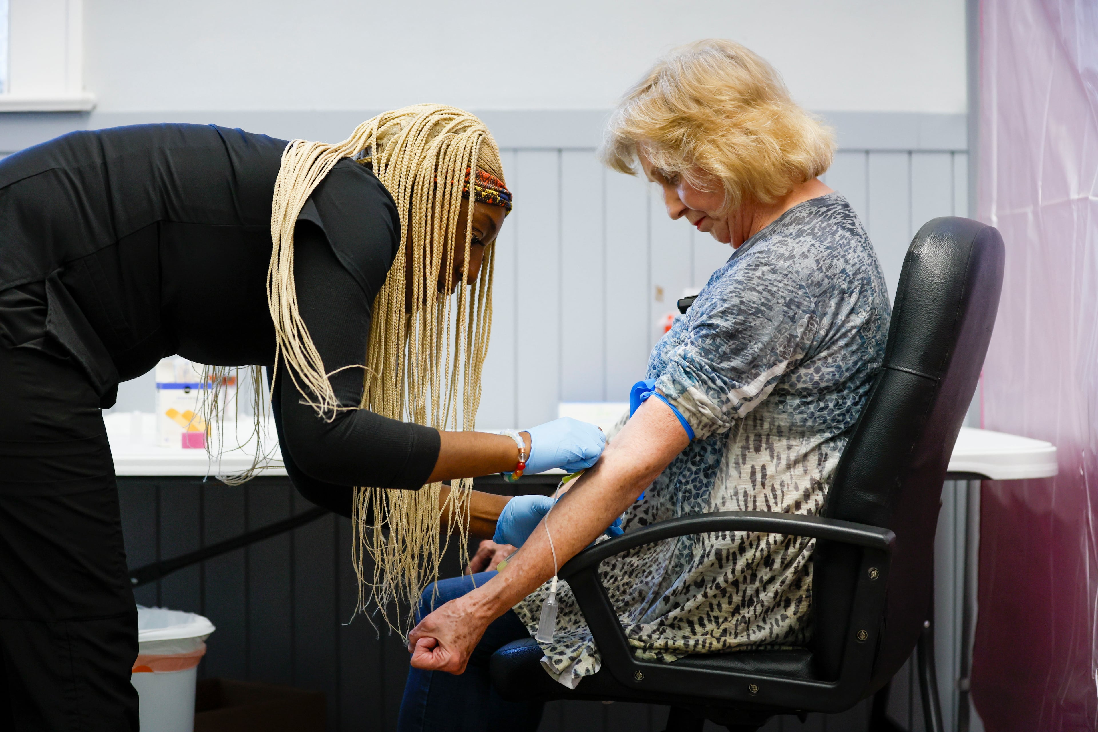 Phlebotomist Chantae Knowles conducted a blood screening for Rome resident Delores Brewer as part of a study led by researchers from Emory University’s Rollins School of Public Health. The study aims to investigate the presence of ‘forever chemicals.’
(Miguel Martinez/ AJC)