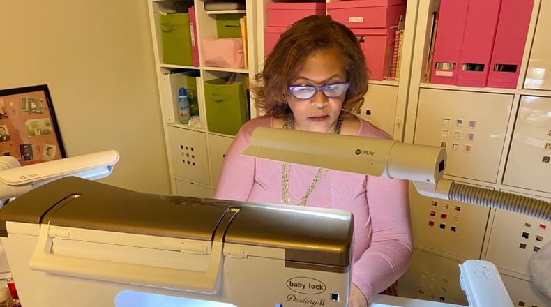 Alcelia Ford, wife of Stockbridge Mayor Anthony Ford, has made face masks for city leaders as the community battles the coronavirus.