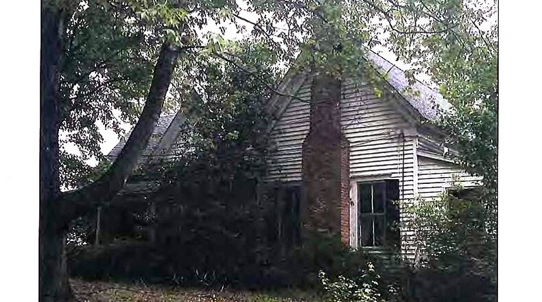 The Gardner House at 133 Cumming St., Alpharetta, dates to about 1930 and is on the city’s Contributing Historic Buildings List. The City Council denied the owner’s request for permission to demolish it. THE PRESERVATIONIST GUILD