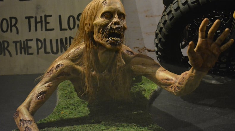 “Bicycle Girl” is one of the zombies from the AMC series, “Walking Dead.” Artifacts from more than 60 different films and television productions are part of a new exhibit at the Carter Library telling the history of the film industry in Georgia. CONTRIBUTED: CARTER LIBRARY