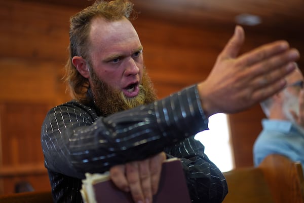 Isaac Green, 34, sings in the tenor section during a Sacred Harp singing event at Holly Springs Primitive Baptist Church in Bremen, Ga., on Sunday, March 23, 2025. (AP Photo/Jessie Wardarski)