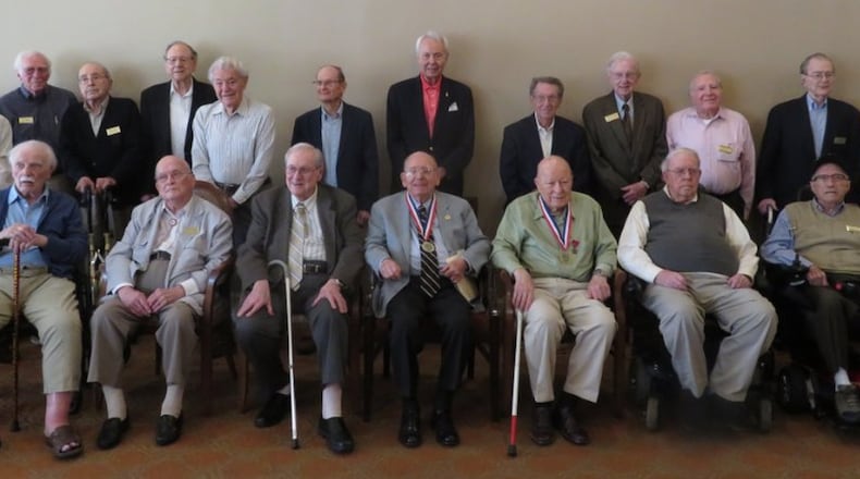 Lavelle Beene (front, third from the right) was a scout in the infantry during World War II and posed with 20 other veterans last year at the Lenbrook senior community in Buckhead. Photo courtesy of Jim Cochrane