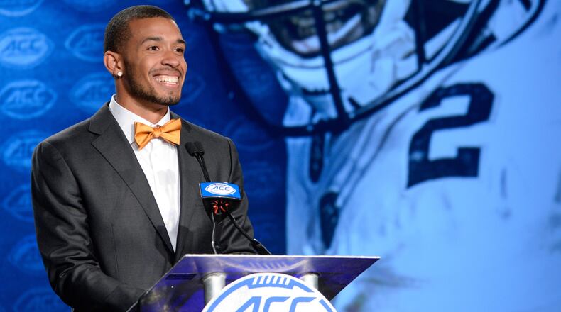 Georgia Tech’s Ricky Jeune reacts to reporters’ compliments on his bow tie during the 2017 ACC Football Kickoff media event in Charlotte, N.C., Friday July 14, 2017. (Photo by Sara D. Davis, the ACC.com)