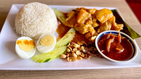 Nasi lemak from Mamak comes with a harmonious assemblage of ingredients. (Angela Hansberger for the AJC)