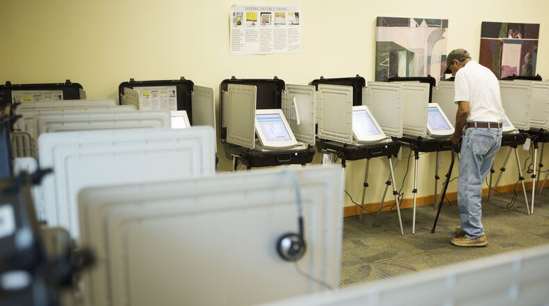Voters turn out at the Roswell Branch Public Library to cast the ballots early in the 6th congressional district special election on Monday June 5th 2017. (Photo by Phil Skinner)