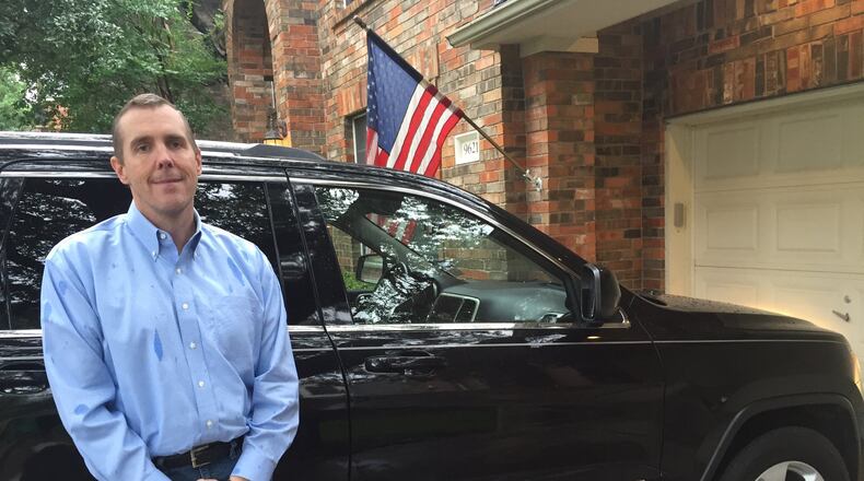 Tom Jennings and his 2011 Jeep Cherokee.