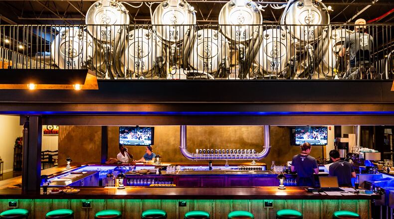 There are beer tanks above the bar at Bold Monk Brewing, which opened in early December. CONTRIBUTED BY HENRI HOLLIS