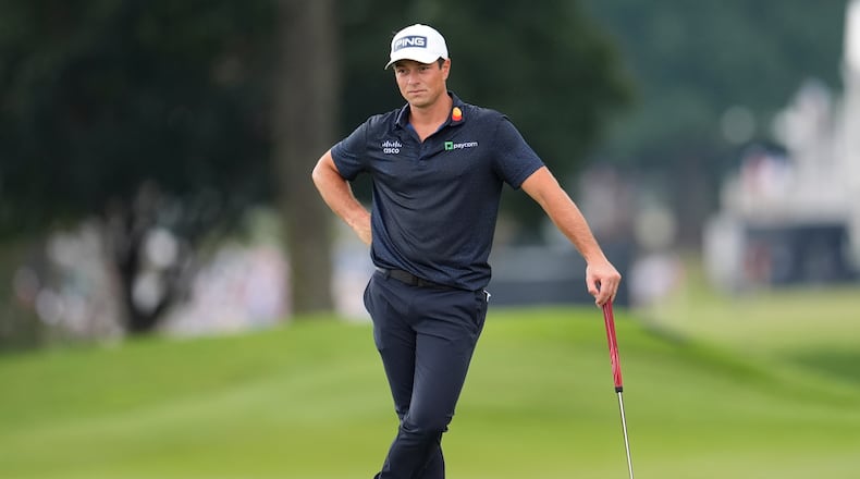 Viktor Hovland, of Norway, waits to putt on the first green during the third round of the PGA Tour Championship golf tournament, Saturday, Aug 29, 2026, in Atlanta.(AP Photo/Mike Stewart)