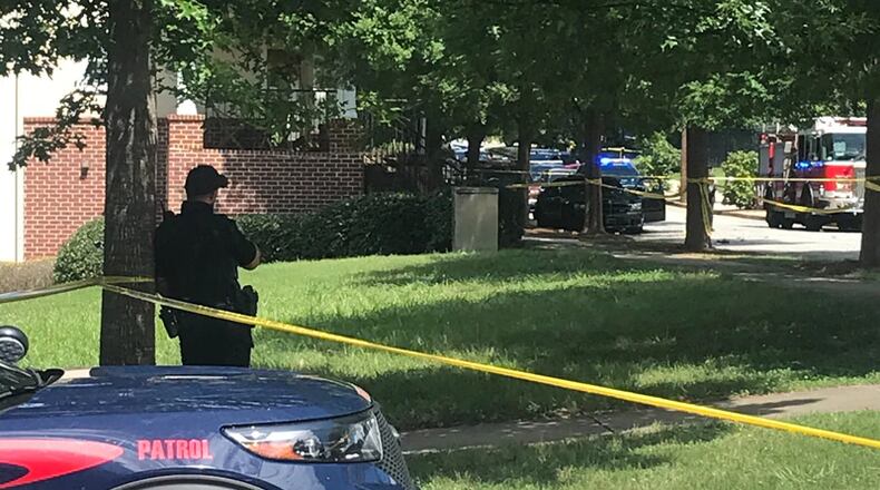 A man was found shot dead in a burning car in southwest Atlanta, police said.