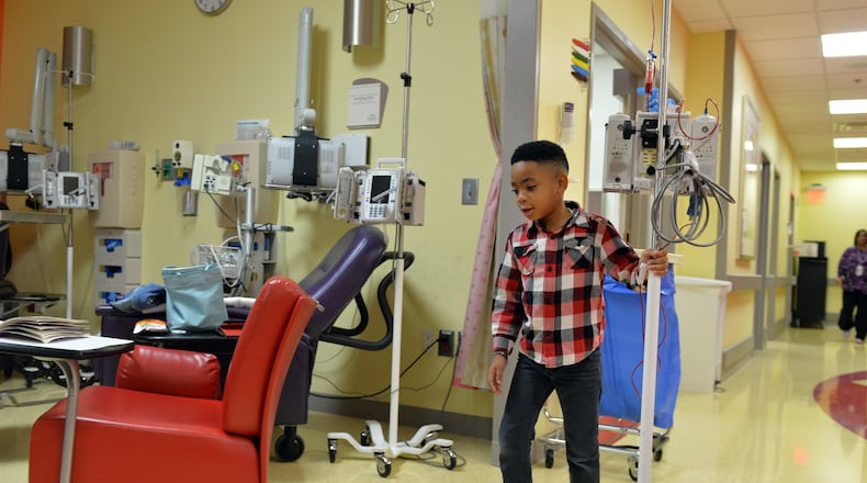 October 23, 2014 Atlanta: Antwon Thornton, 6, pushes his I.V pole while receiving a transfusion at Children's  Healthcare of Atlanta at Hughes Spalding Thursday October 23, 2014.  Thornton, who suffers from sickle cell disease, had his first stroke just before his second birthday. BRANT SANDERLIN / BSANDERLIN@AJC.COM