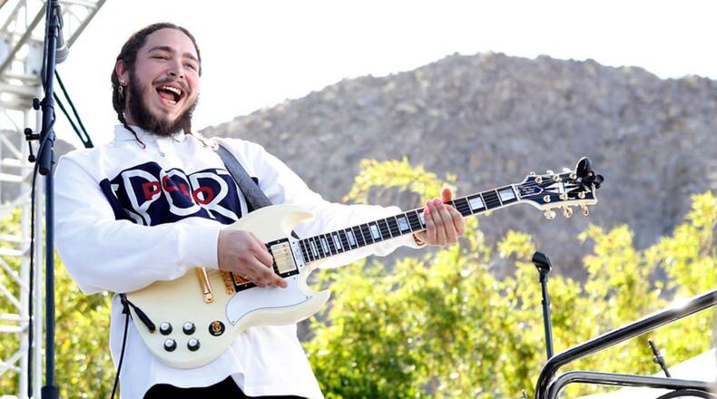 Post Malone. File photo. (Photo by Randy Shropshire/Getty Images for Universal Music)