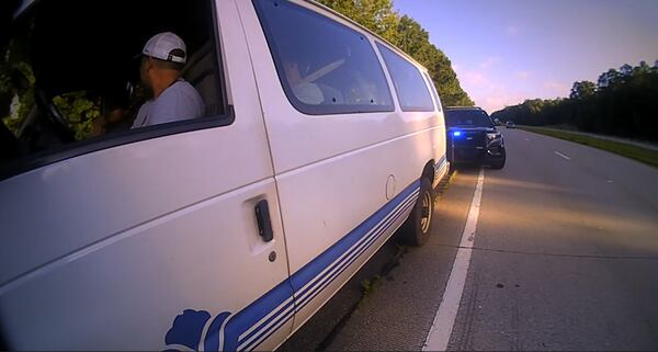 View of work van pulled over and Jefferson police patrol vehicle. (Courtesy of Jefferson Police Department)