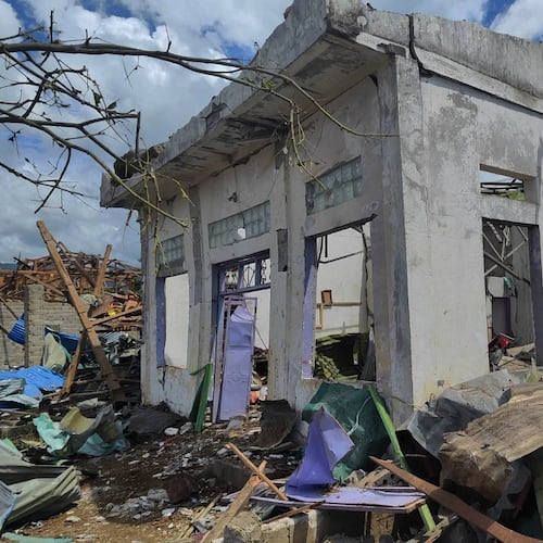 This handout photo provided by Palaung Land shows debris of the buildings destroyed in an explosion in Kaungtup village, Namhkam township, Shan State, Myanmar, on Sunday, May 31, 2026. (Palaung Land via AP)