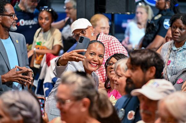 Keisha Lance Bottoms poses for a selfie with constituents at a rally on Saturday, June 27, 2026, in Savannah. (Sarah Peacock for the AJC)