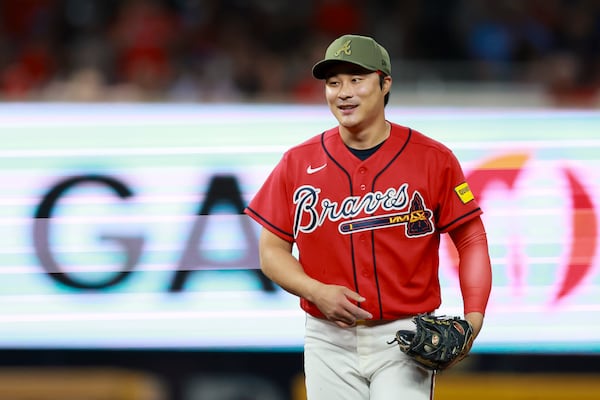 Braves shortstop Ha-Seong Kim smiles after making a catch for an out against the Red Sox on Friday, May 15, 2026, at Truist Park in Atlanta. The Braves re-signed Kim to a one-year, $20 million deal. (Jason Getz/AJC)