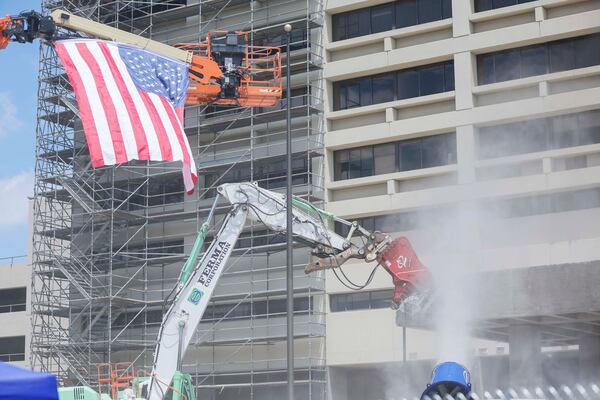 Heavy machinery begins demolishing the Atlanta Medical Center as the site undergoes its transformation into a new face of the developing project on Monday, June 30, 2025. The AMC served the surrounding communities for over a century. 
(Miguel Martinez/ AJC)