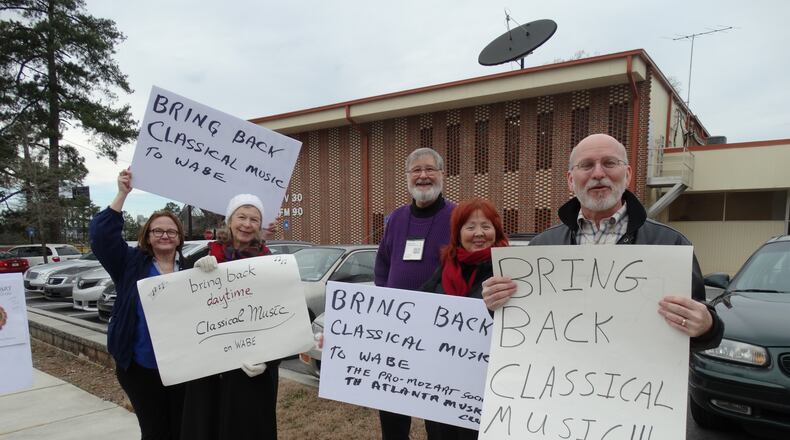 Protesters outside WABE's headquarters before the quarterly board meeting last month. CREDIT: Rodney Ho/ rho@ajc.com