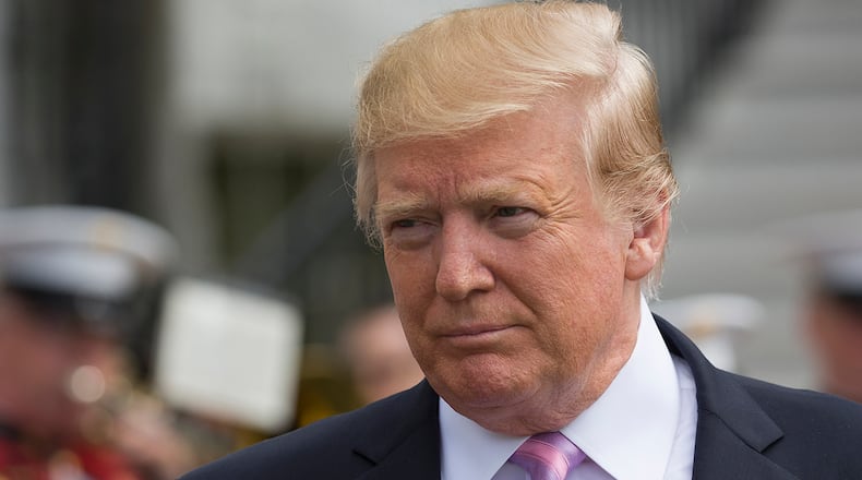 President Donald Trump walks on the South Lawn of the White House in Washington, Monday, April 22, 2019, during the annual White House Easter Egg Roll. (AP Photo/Alex Brandon)