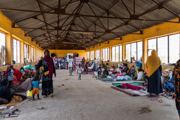This June 2023 photo provided by the World Food Program shows internally displaced persons at the Wad Almajzoub farm camp in Wad Medani, Gezira state, Sudan. (Ala Kheir/U.N. Office for the Coordination of Humanitarian Affairs via AP)