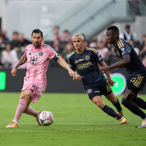 Inter Miami forward Lionel Messi (10) comes under pressure from Philadelphia Union midfielder Jovan Lukic (4), midfielder Cavan Sullivan (6), and midfielder Danley Jean Jacques (21), during the first half of an MLS soccer match, Sunday, May 24, 2026, in Miami. (AP Photo/Rebecca Blackwell)