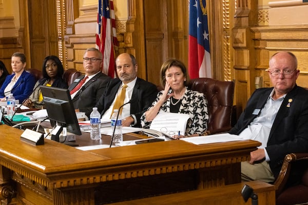 Members of the State Election Board during a July meeting.