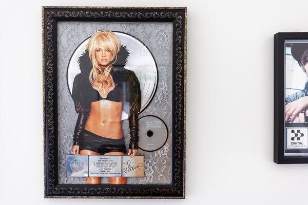 A view of a Britney Spears commemorative record in the home office of Tab Nkhereanye, senior vice president of Artists & Repertoire at BMG, in Atlanta on Thursday, June 26, 2025. (Arvin Temkar/AJC)