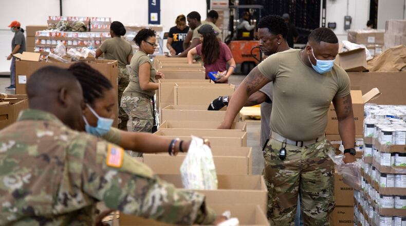 About 20 to 30 Georgia National Guard members are working at the food bank headquarters. STEVE SCHAEFER FOR THE ATLANTA JOURNAL-CONSTITUTION