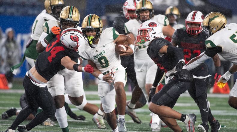 Jekail Middlebrook of Langston Hughes breaks through the pack during the Hughes vs Gainesville High School football game on Friday, Dec. 9, 2022, at the Georgia State Stadium in Atlanta, Georgia. (Jamie Spaar for the Atlanta Journal Constitution)