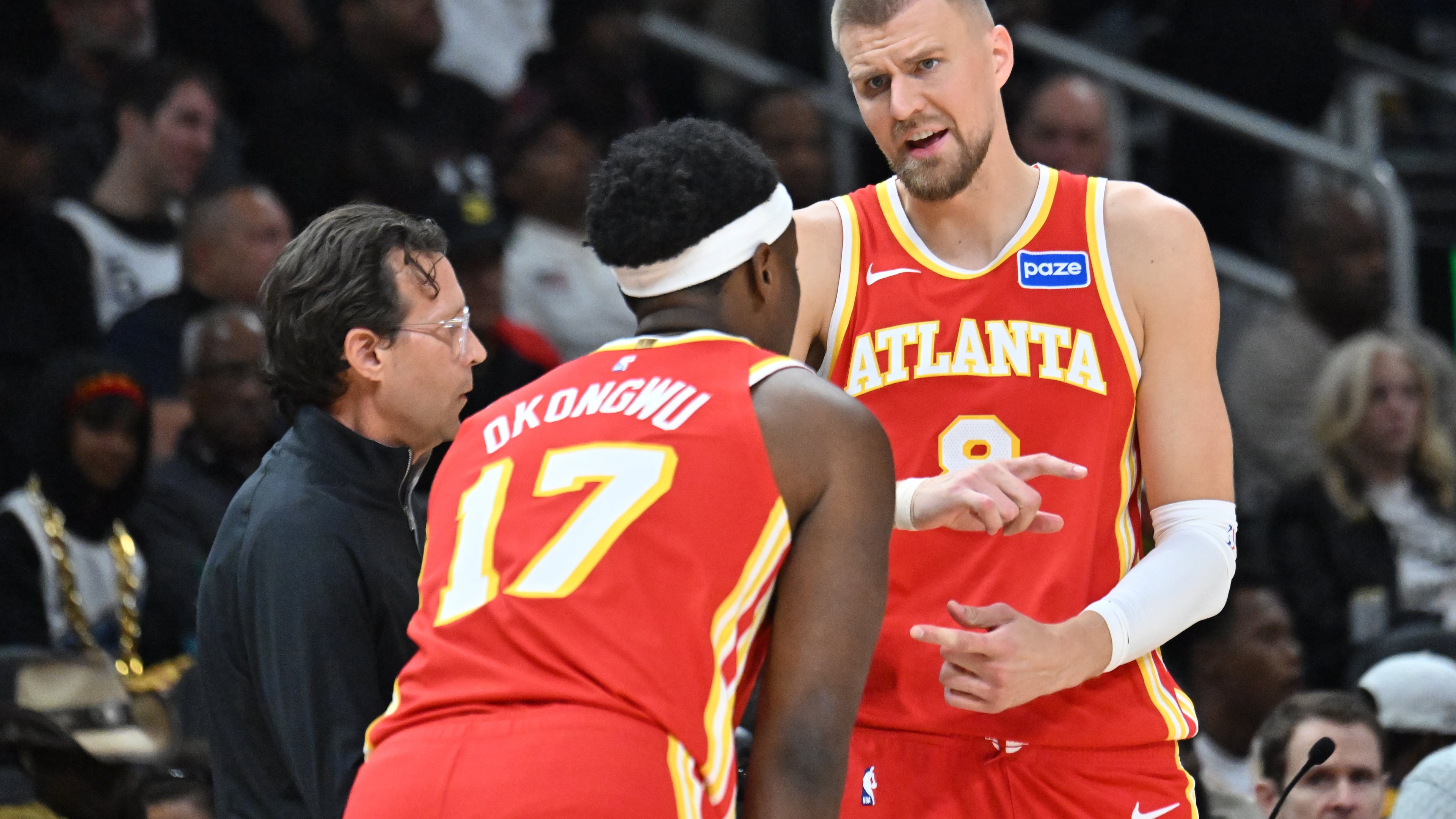Atlanta Hawks center Kristaps Porziņģis will miss the team's game against the Orlando Magic on Friday with what the injury report called 'flu-like symptoms'. (Hyosub Shin/AJC)