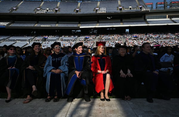 Georgia State University faculty members participate in a 2022 commencement ceremony. (Hyosub Shin / Hyosub.Shin@ajc.com)