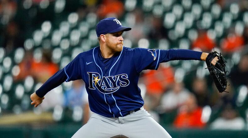 Tampa Bay Rays relief pitcher Collin McHugh throws a pitch to the Baltimore Orioles during the sixth inning of a baseball game, Tuesday, May 18, 2021, in Baltimore. (AP Photo/Julio Cortez)