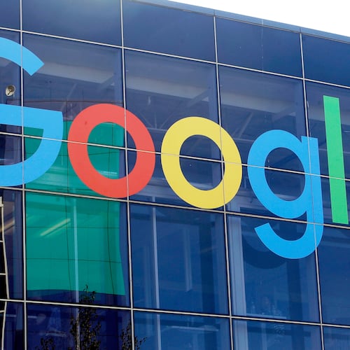 FILE - A sign is displayed on a Google building at their campus in Mountain View, Calif., Sept. 24, 2019. (AP Photo/Jeff Chiu, File)