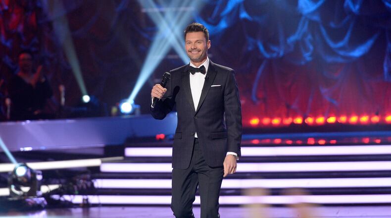 Ryan Seacrest got sideswiped by a car while riding a bike. CREDIT: Getty Images