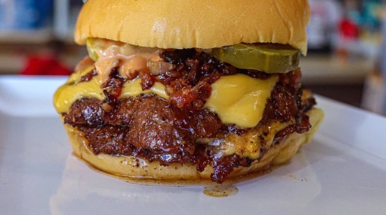 A Billy’s Classic, with bacon and grilled onions, is one of the standout creations at NFA Burger in Dunwoody. CONTRIBUTED BY @DINEINAFLASH