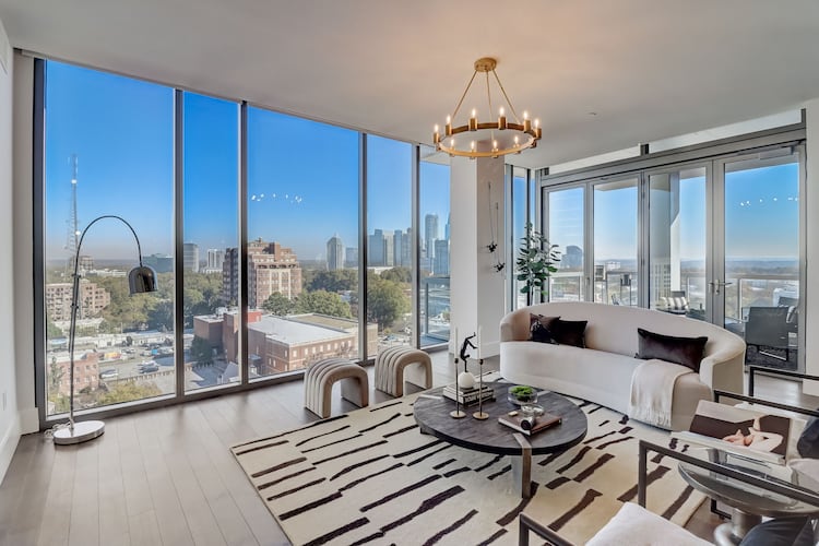 Represented by Compass realtor Ericka Mitchell (ericka.mitchell@compass.com), Former Atlanta Hawks power forward John Collins’ Atlanta condo is stunning. Photos courtesy of ShowingTimePlus