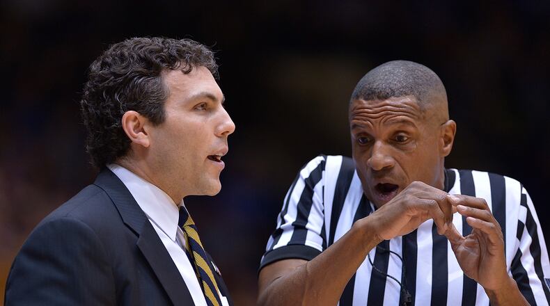 Head coach Josh Pastner of the Georgia Tech Yellow Jackets talks with official Ted Valentine during the game against the Duke Blue Devils at Cameron Indoor Stadium on January 4, 2017 in Durham, North Carolina. (Photo by Grant Halverson/Getty Images)