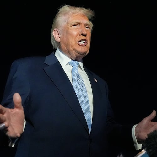 President Donald Trump speaks to reporters before boarding Air Force One at Palm Beach International Airport in West Palm Beach Fla., on his way back to the White House, Sunday, Nov. 16, 2025. (AP Photo/Manuel Balce Ceneta)