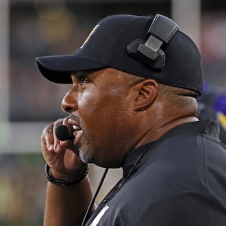 Kennesaw State head coach Jerry Mack directs his players in the first half of an NCAA college football game against Wake Forest, Friday, Aug. 29, 2025, in Winston-Salem, N.C. (Walt Unks/The Winston-Salem Journal via AP)
