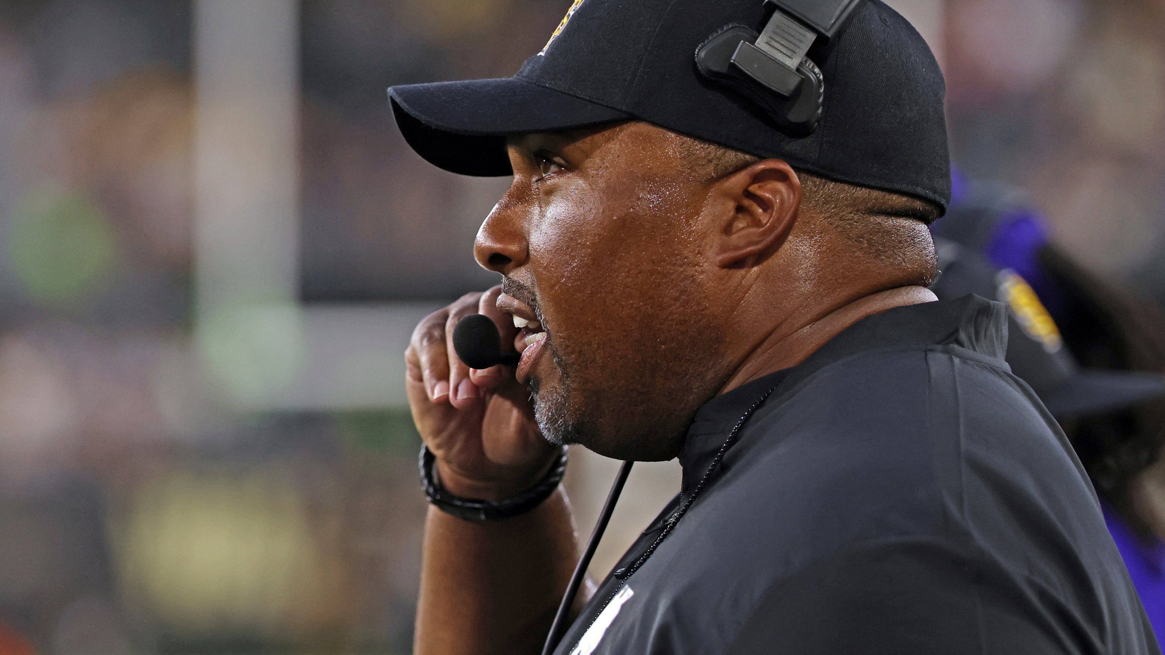 Kennesaw State head coach Jerry Mack directs his players in the first half of an NCAA college football game against Wake Forest, Friday, Aug. 29, 2025, in Winston-Salem, N.C. (Walt Unks/The Winston-Salem Journal via AP)