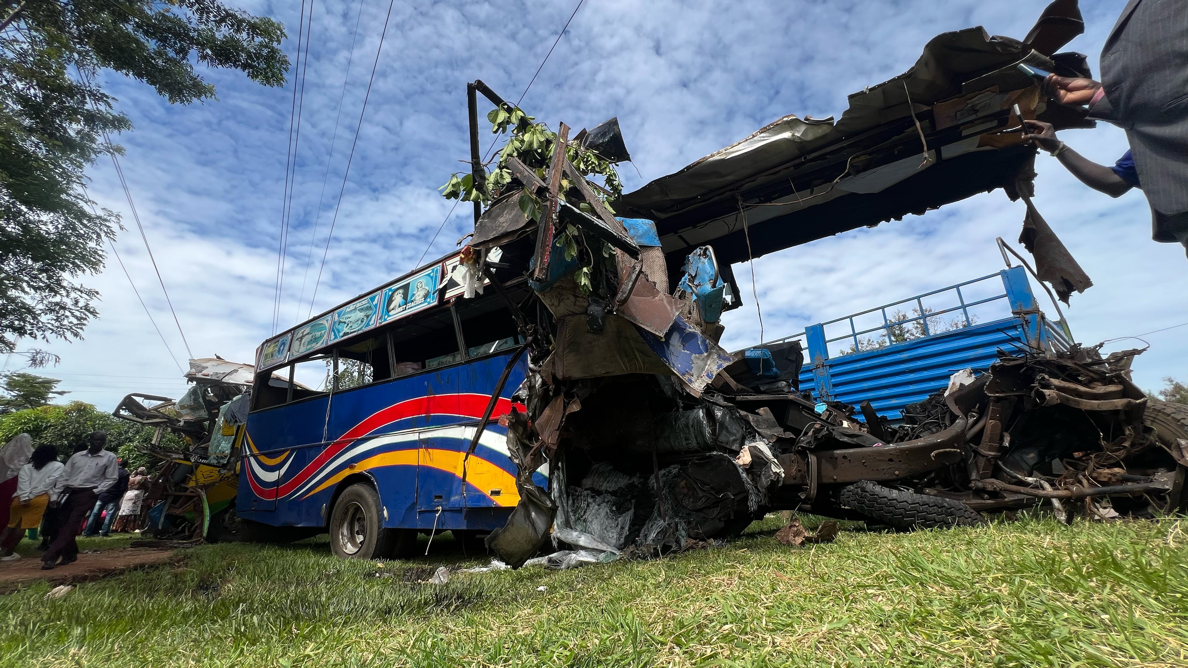 A bus involved in a highway collision that left dozens dead near Gulu, northern Uganda, on Wednesday,Oct. 22, 2025. (AP Photo/ Hakiim Wampamba)