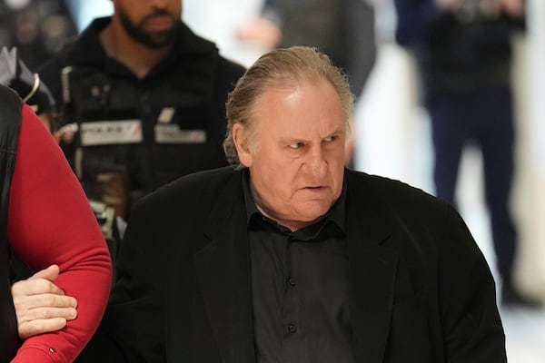 Actor Gerard Depardieu arrives at his trial for the alleged sexual assaults of two women on a film set in 2021, Thursday, March 27, 2025 in Paris. (AP Photo/Aurelien Morissard)