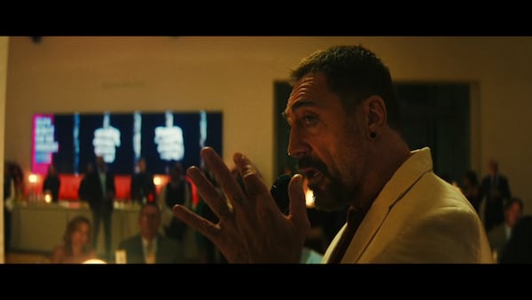 Javier Bardem plays ex-con Max Cady in the television version of "Cape Fear" on Apple TV. In the first episode, Cady appears at a fundraiser shot in the main lobby of the High Museum. That screen on the left is usually behind the employees who check in High Museum entrants. The space behind Bardem is usually the cafe. (Courtesy of Apple TV)