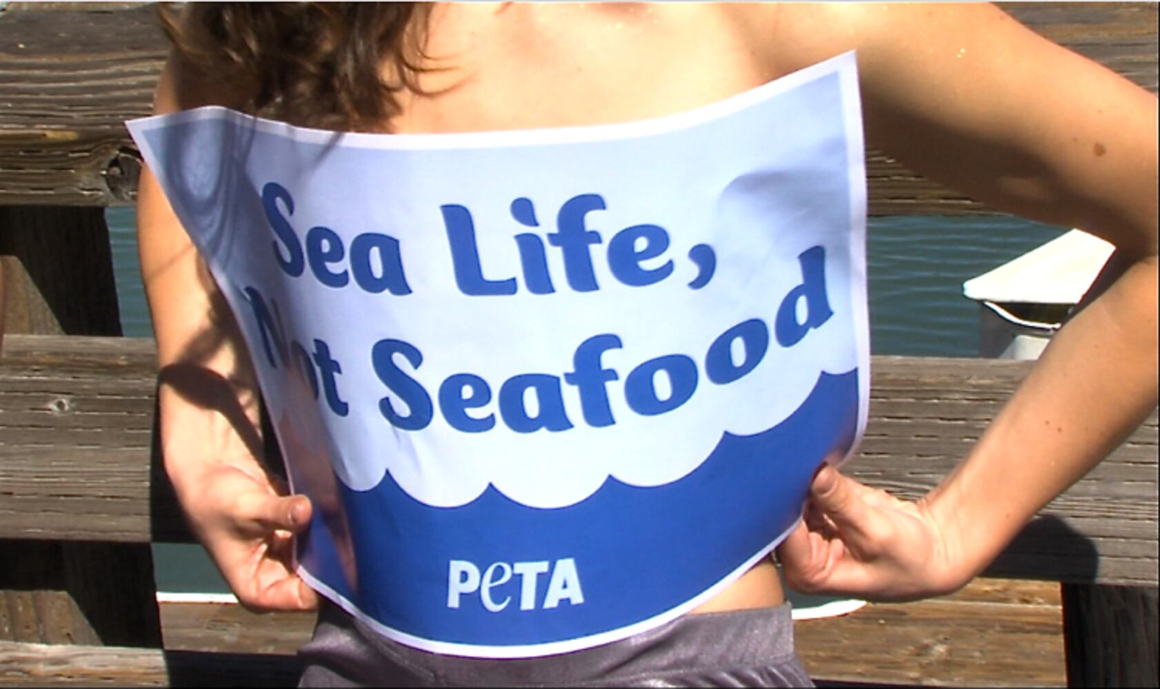 PETA and topless mermaids against seafood