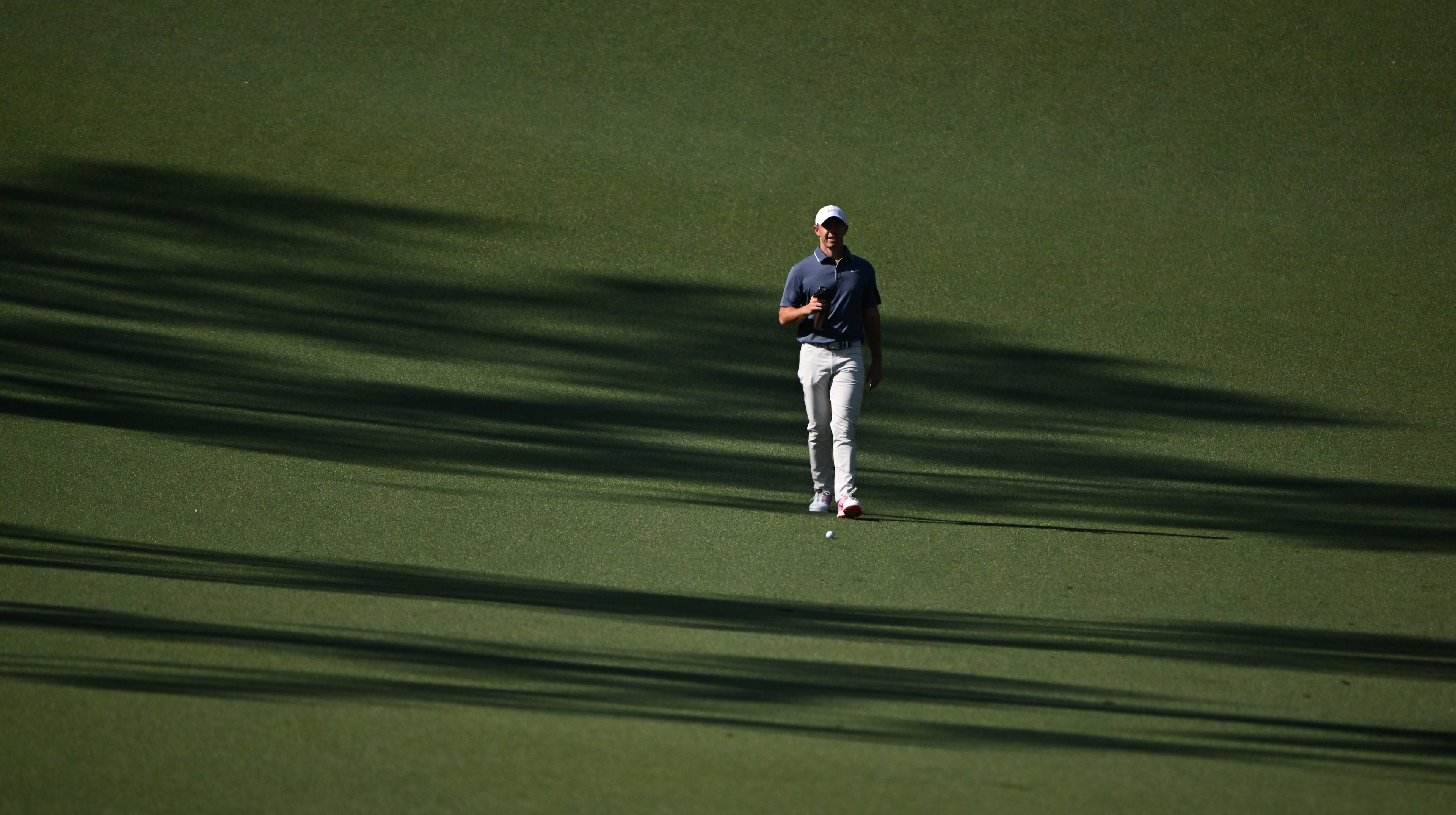 Rory McIlroy walks to his ball on tenth fairway during final round of the Masters golf tournament, at Augusta National Golf Club, Saturday, April 13, 2025, in Augusta, Ga. (Hyosub Shin / AJC)