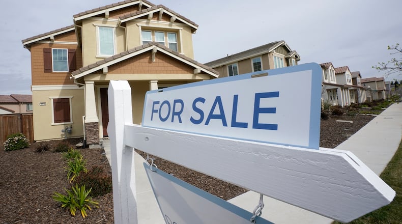 FILE - A "for sale" sign is posted in front of a home in Sacramento, Calif., March 3, 2022. Mortgage rates have been mostly ticking higher lately, but it’s not all bad news for home shoppers. (AP Photo/Rich Pedroncelli, File)