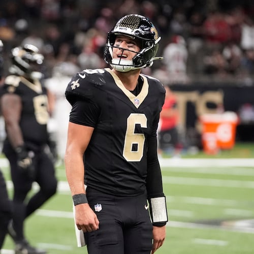 New Orleans Saints quarterback Tyler Shough (6) walks off the field after throwing an interception against the Atlanta Falcons in the second half of an NFL football game, Sunday, Nov. 23, 2025, in New Orleans. (AP Photo/Gerald Herbert)