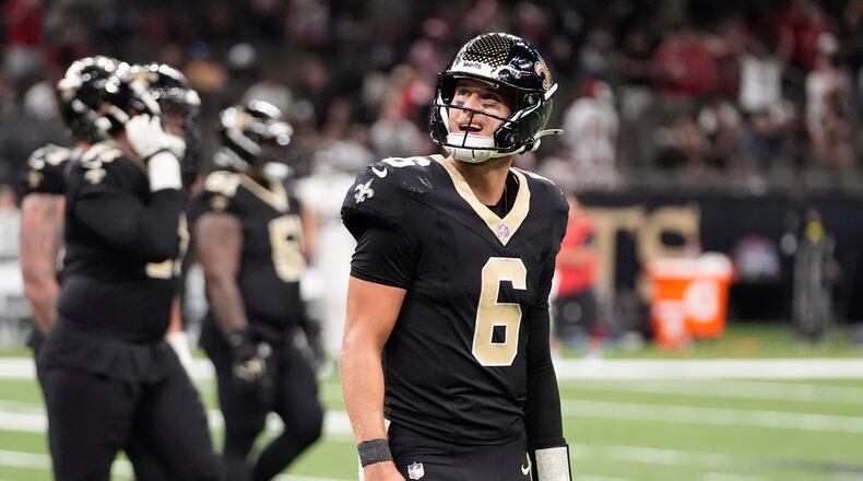 New Orleans Saints quarterback Tyler Shough (6) walks off the field after throwing an interception against the Atlanta Falcons in the second half of an NFL football game, Sunday, Nov. 23, 2025, in New Orleans. (AP Photo/Gerald Herbert)